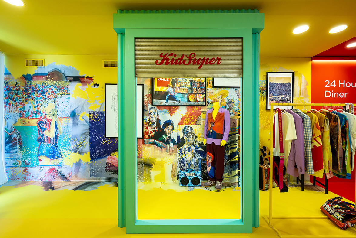 A store with colorful walls and a yellow ceiling Description automatically generated